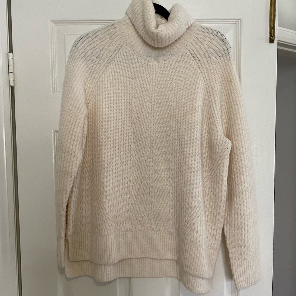Cream colored Madewell turtleneck sweater